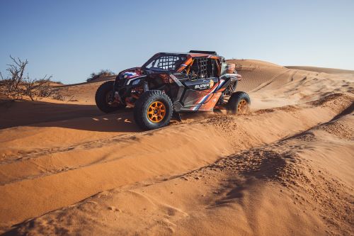 Dune buggy driving in the sand